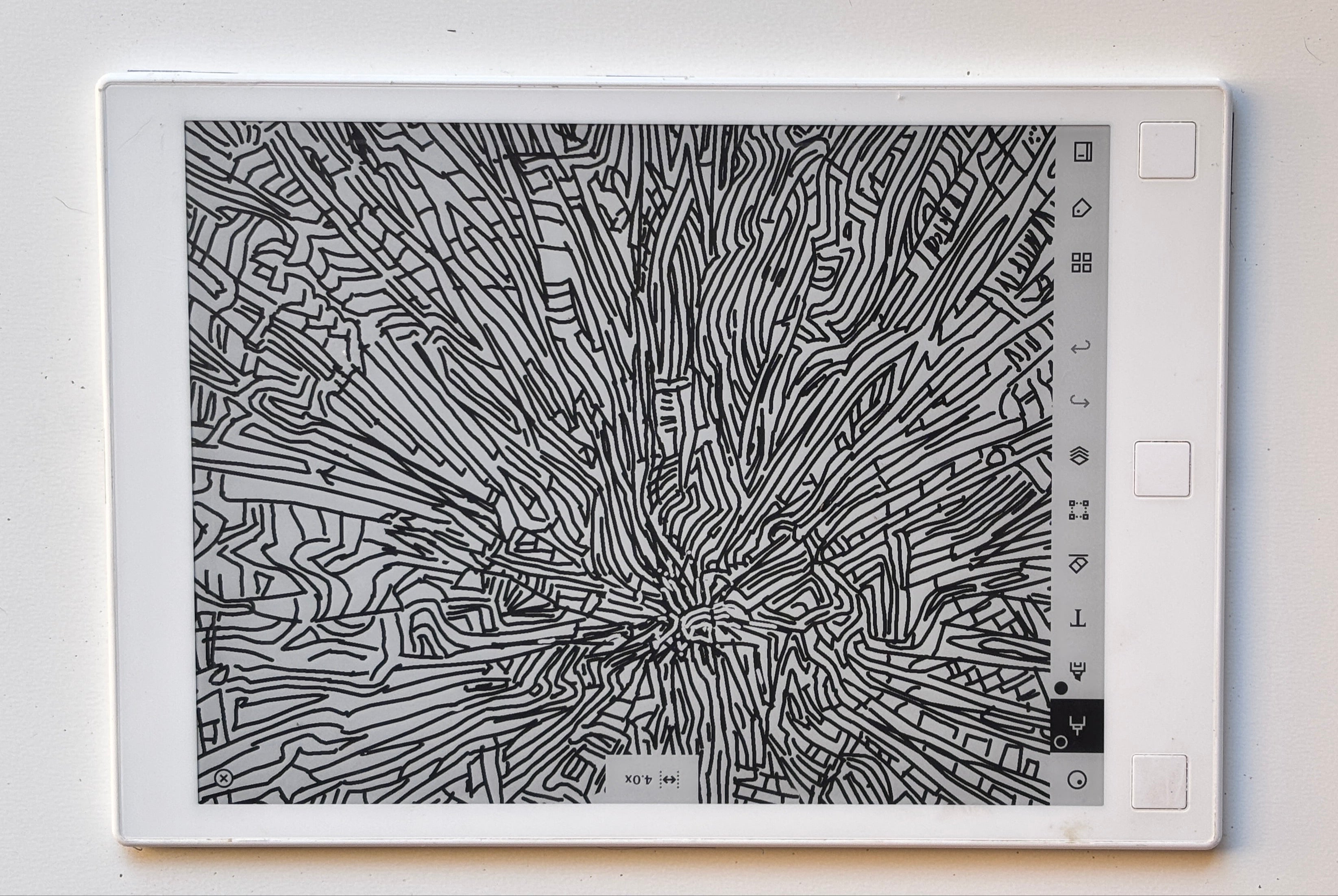 Digital drawing on a tablet with a black and white abstract pattern on a white background